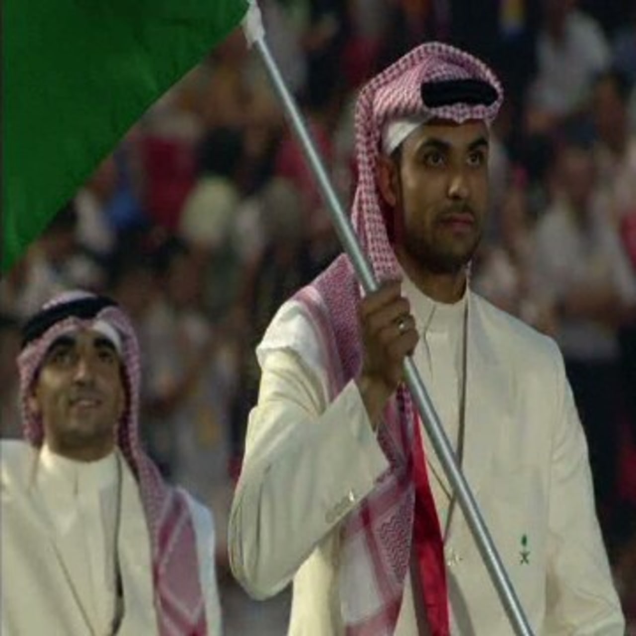 開会式で行進するサウジアラビア選手団