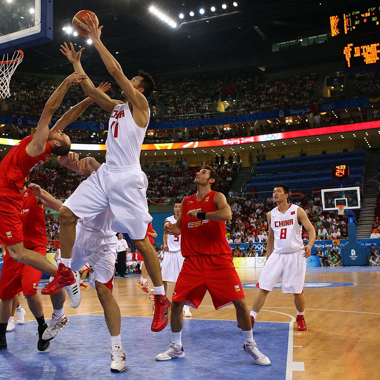 China's Yao Ming, right, of the NBA's Houston Rockets guards Spain's Rudy  Fernandez during men's basketball game at the Beijing 2008 Olympics in  Beijing, Tuesday, Aug. 12, 2008. Spain defeated China 85-75