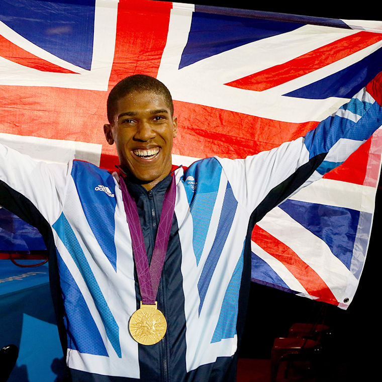 Joshua gets gold medal in men's super heavyweight boxing in London 2012