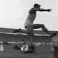 Jesse Owens jumps for gold