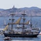 Thousands gather in Marseille to watch the Olympic flame arrive in France