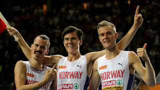 Henrik Ingebrigtsen of Norway, Jakob Ingebrigtsen of Norway, and Filip Ingebrigtsen of Norway celebrate Jakob's gold in the Men's 1500m Final during day four of the 24th European Athletics Championships. (Photo by Alexander Hassenstein/Getty Images)