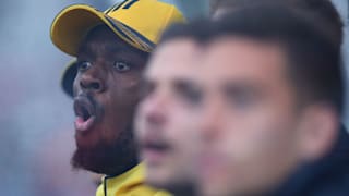 Usain Bolt looks animated during Central Coast's A-League trial match with Newcastle