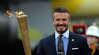 DAVID BECKHAM WITH THE OLYMPIC TORCH