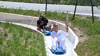 Julia Pereira de Sousa, Olympic medallist in Snowboard, on a luge with the Olympic Torch