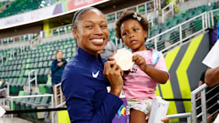 Bronze medalist Allyson Felix of Team USA with her daughter Camryn after winning bronze in the 4x400m Mixed Relay Final on day one of the World Athletics Championships