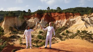 The Olympic Torch in Rustrel, Vaucluse, during the stage 35 of the Olympic Torch Relay