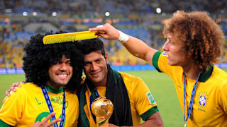RIO DE JANEIRO, BRAZIL - JUNE 30: Daniel Alves (L) celebrates with team-mates Hulk and David Luiz of Brazil at the end of the FIFA Confederations Cup Brazil 2013 Final match between Brazil and Spain at Maracana on June 30, 2013 in Rio de Janeiro, Brazil. (Photo by Michael Regan/Getty Images) 