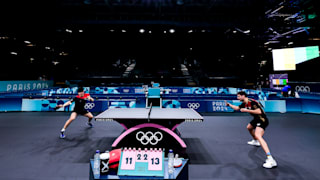 Dang Qiu and Dimitrij Ovtcharov of Germany practice during a table tennis training session at South Paris Arena