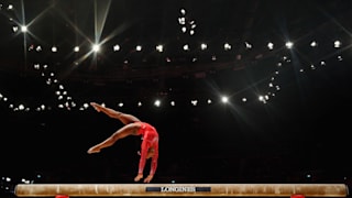Simone Biles tumbling on the balance beam during the all-around final at the 2015 Worlds