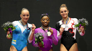 Sanne Wevers (left), Simone Biles (center) and Pauline Schafer (right) share the beam podium at the 2015 Worlds