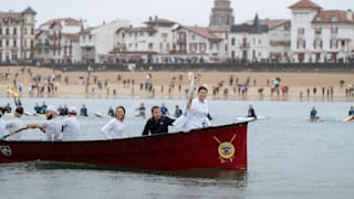 The Olympic Torch on a boat during the stage 12 of the Olympic Torch Relay in the Pyrénées-Atlantiques 