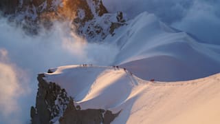 The Olympic Torch at the top of the Aiguille du midi during the stage 39