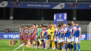 Bengaluru FC players line up with rescued dogs