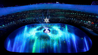 The Olympic Cauldron is seen as performers dance during the Beijing 2022 Winter Olympics Closing Ceremony