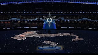 The Olympic Cauldron is seen as performers dance during the Beijing 2022 Winter Olympics Closing Ceremony 