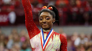 Simone Biles celebrates