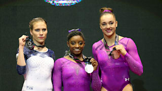 Ksenia Afanasyeva (left), Simone Biles (center) and Maggie Nichols (right) share the floor exercise podium at the 2015 Worlds