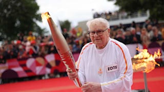 Roger Lebranchu, 101, carries the torch in Mont-Saint-Michel