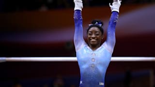 Simone Biles salutes during the uneven bars final at the 2018 Worlds