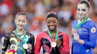 Bai Yawen (left), Simone Biles (middle), and Aliya Mustafina (right), claimed the balance beam medals at the 2014 Worlds