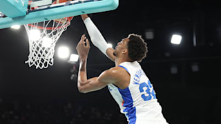 Victor Wembanyama #32 of Team France dunks during the Men's Gold Medal game