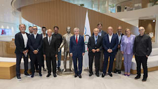 IOC / Greg Martin. The President with the World Skate Board at Olympic House.