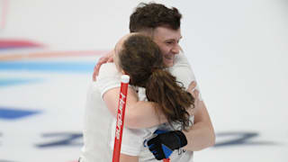 Bruce Mouat and Jennifer Dodds of Team Great Britain celebrate victory during the Curling Mixed Doubles Round Robin