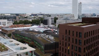 View from French Building Rooftop at Olympic Village with Stade de France and Aquatic Center in the background