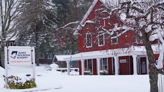 A snowy Burke Mountain Academy campus during the autumn 2023