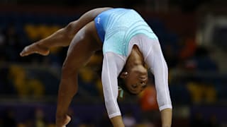 Simone Biles tumbles on the balance beam during the all-around final at the 2018 Worlds