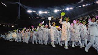 Japan delegation waving at Athens 2004 opening ceremony