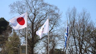 Greece, Japan and Olympic flags at the Torch relay lighting ceremony