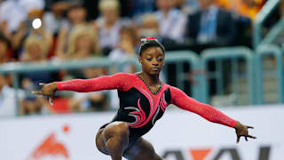 Simone Biles claims beam title at 2014 Worlds