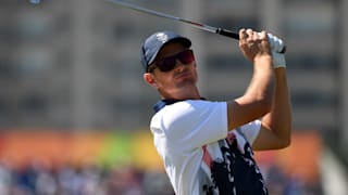 Justin Rose of Great Britain plays his shot from the eighth tee during the final round of men's golf on Day 9 of the Rio 2016 Olympic Games. 