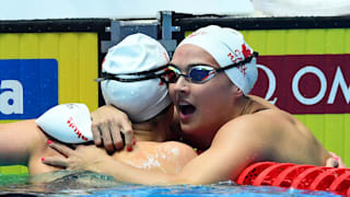 Taylor Ruck (L) and Kylie Masse of Canada celebrate after the Women's 100m Backstroke Final on day three of the Gwangju 2019 FINA World Championships at Nambu International Aquatics Centre on July 23, 2019 in Gwangju, South Korea. (Photo by Quinn Rooney/Getty Images)