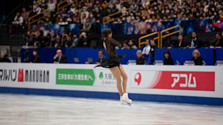Evgenia Medvedeva performs a jump during her bronze medal free skate