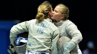 Alina Moseyko of Russian Federation and Chiara Crovari of Italy after Women's Sabre Final