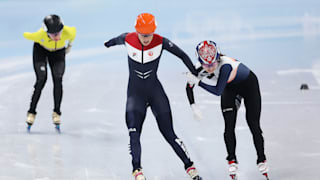 Suzanne Schulting of Team Netherlands and Minjeong Choi of Team South Korea compete as they cross the finish line during the Women's 1000m Final A on day seven of the Beijing 2022 Winter Olympic Games