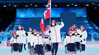 Kjartan Haugen carry the flag for the Norway team during the opening ceremony of the Beijing 2022 Winter Paralympic Games