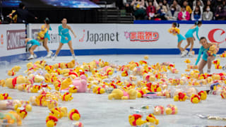 Winnie the Pooh soft toys on the ice after Yuzuru Hanyu's free skate