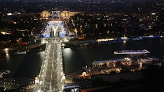 A general view over the city of Paris as athlete boats travel along the River Seine