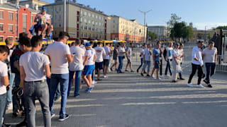 Tennis umpire moderates queue.
