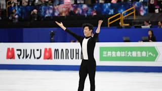 Nathan Chen waves to the crowd after his short program at 2019 Worlds