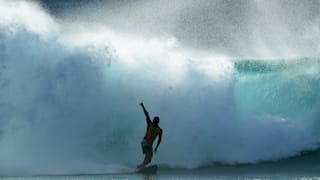 Italo Ferreira celebrates during the 2019 Pipe Masters in Haleiwa, Hawaii