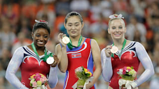 Simone Biles (left), Hong Un-Jong (middle) and MyKayla Skinner (right) share the vault podium at the 2014 World Championships
