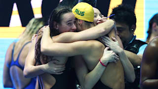 Australia hug after they set a new world record of 7:41.50 in the Women's 4x200m Freestyle Final on day five of the Gwangju 2019 FINA World Championships at Nambu International Aquatics Centre on July 25, 2019 in Gwangju, South Korea. (Photo by Catherine Ivill/Getty Images)