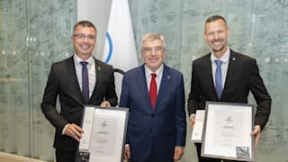 IOC / Greg Martin. The President with Slovak Olympians Peter Korčok and Matej Tóth.