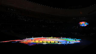 A multi-coloured face is displayed during the Opening Ceremony of the Beijing 2022 Winter Paralympics