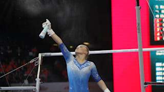 Angelina Melnikova readying the uneven bars at the 2019 World Championships (Photo: Olympic Channel)